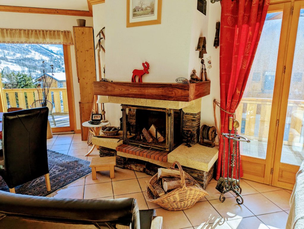 Living area chalet alp with a fire place